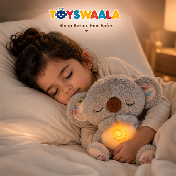 Child sleeping with a glowing koala toy in bed, featuring the TOYSWAALA brand.